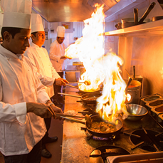 Chef's Preparing Meal – Rose Indienne