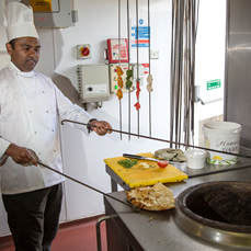 Chef Making Naan Bread – Rose Indienne